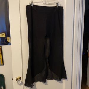 Serious brand black miniskirt with long fishnet overskirt open in center. Size L